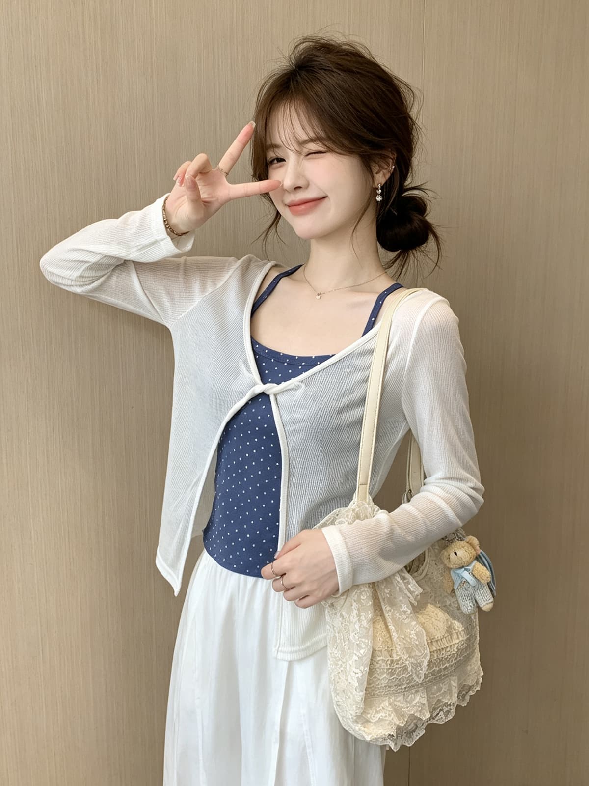 미니멀리즘 소녀 바람 디자인 센스 나비 매듭 니트 슬립 여성 여름 새로운 루즈핏 다용도 긴팔 자외선 차단 블라우스 이미지 3