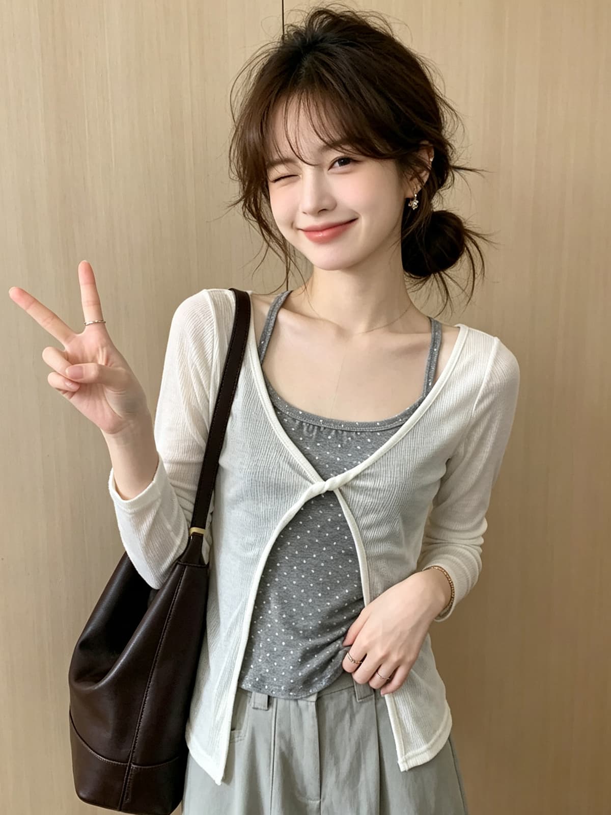 미니멀리즘 소녀 바람 디자인 센스 나비 매듭 니트 슬립 여성 여름 새로운 루즈핏 다용도 긴팔 자외선 차단 블라우스 이미지 4