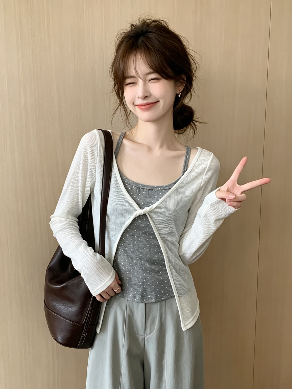 미니멀리즘 소녀 바람 디자인 센스 나비 매듭 니트 슬립 여성 여름 새로운 루즈핏 다용도 긴팔 자외선 차단 블라우스 상세 이미지 2