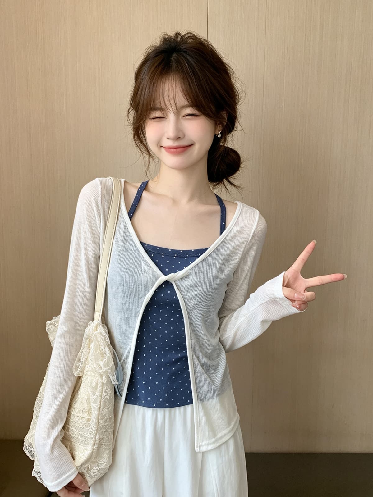 미니멀리즘 소녀 바람 디자인 센스 나비 매듭 니트 슬립 여성 여름 새로운 루즈핏 다용도 긴팔 자외선 차단 블라우스 상세 이미지 3