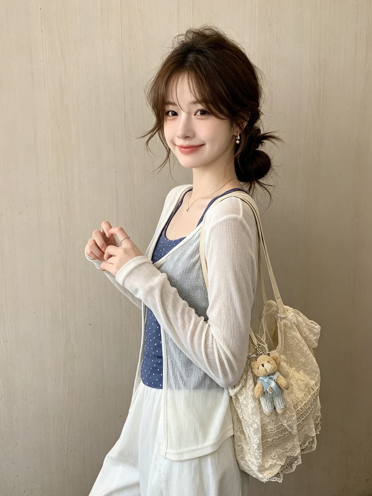 미니멀리즘 소녀 바람 디자인 센스 나비 매듭 니트 슬립 여성 여름 새로운 루즈핏 다용도 긴팔 자외선 차단 블라우스 상세 이미지 4