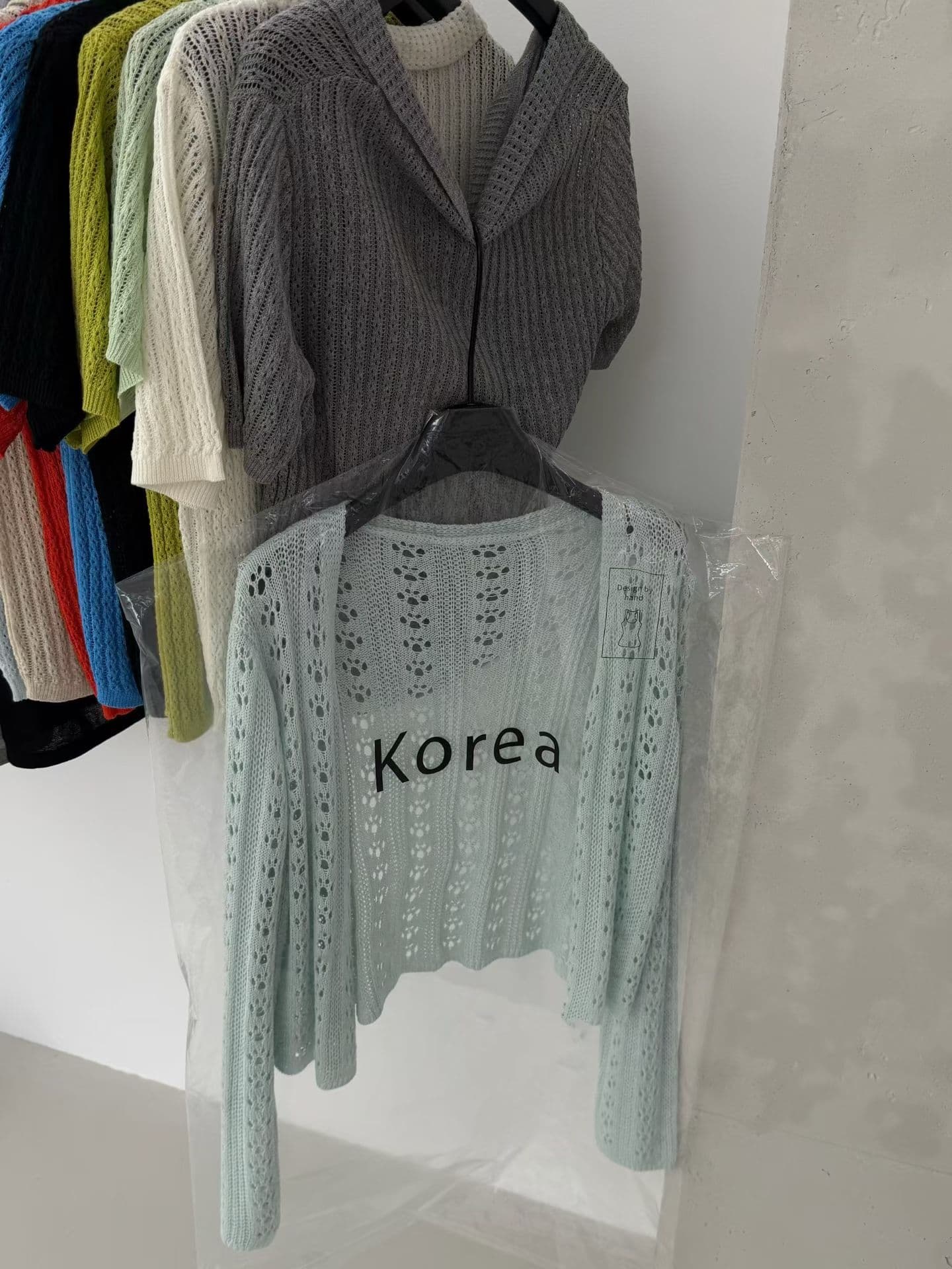한국 동대문 새로운 단색 다용도 홀로우 아웃 니트 오픈 가디건 여성 휴가 바람 상세 이미지 19