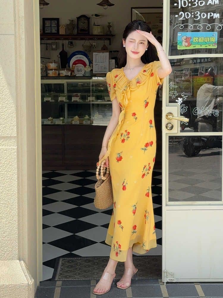 프랑스식 품격 허리 수축 황색 꽃무늬 여성 드레스 2025 여름 새로운 휴가 바람 우아함 패션 인어 꼬리 스커트
