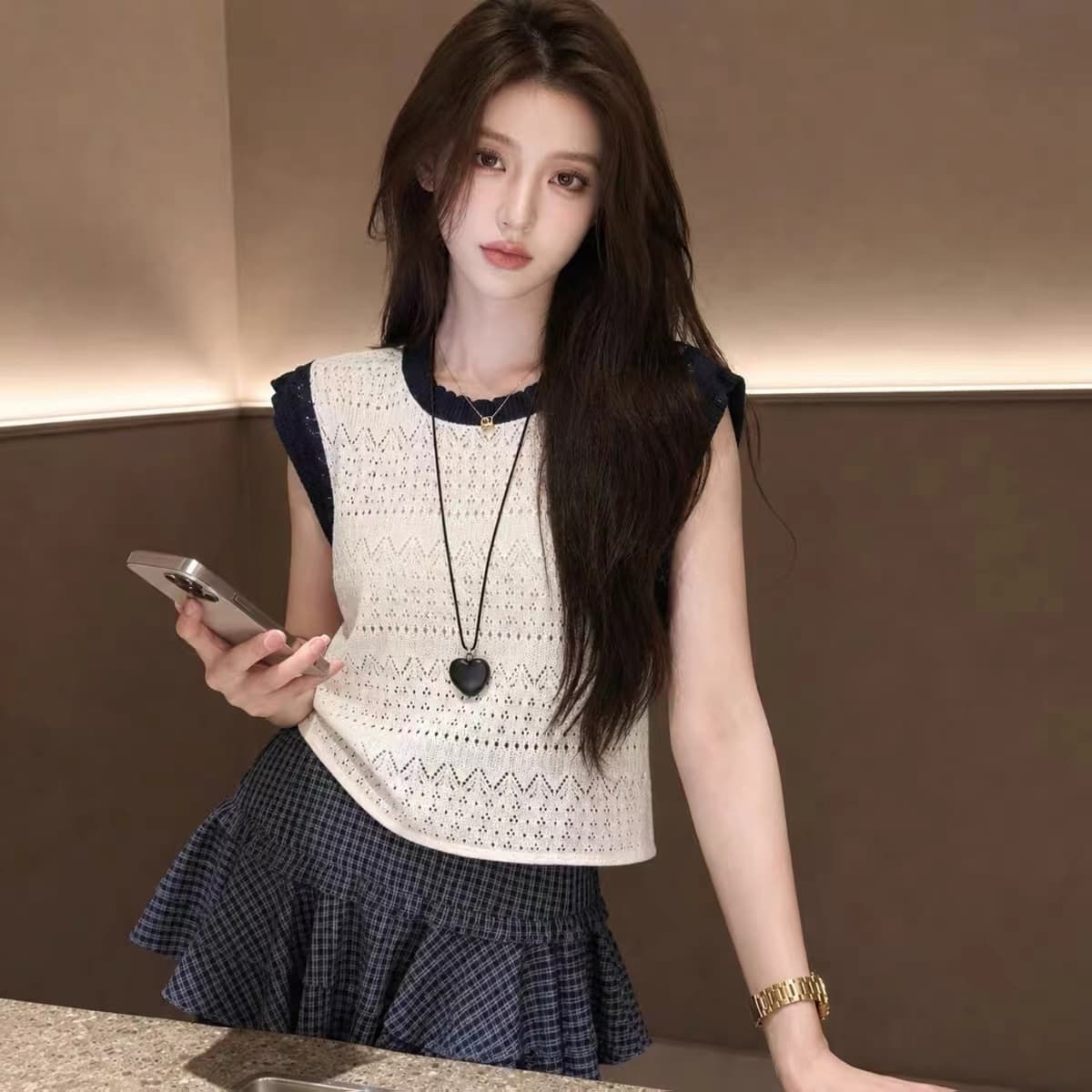 배색 디자인 센스 홀로우 아웃 얼음 실크 니트 스웨터 2026 여름 새로운 느긋한 바람 출퇴근 패션 외국 가스 맨위 여성 상세 이미지 7