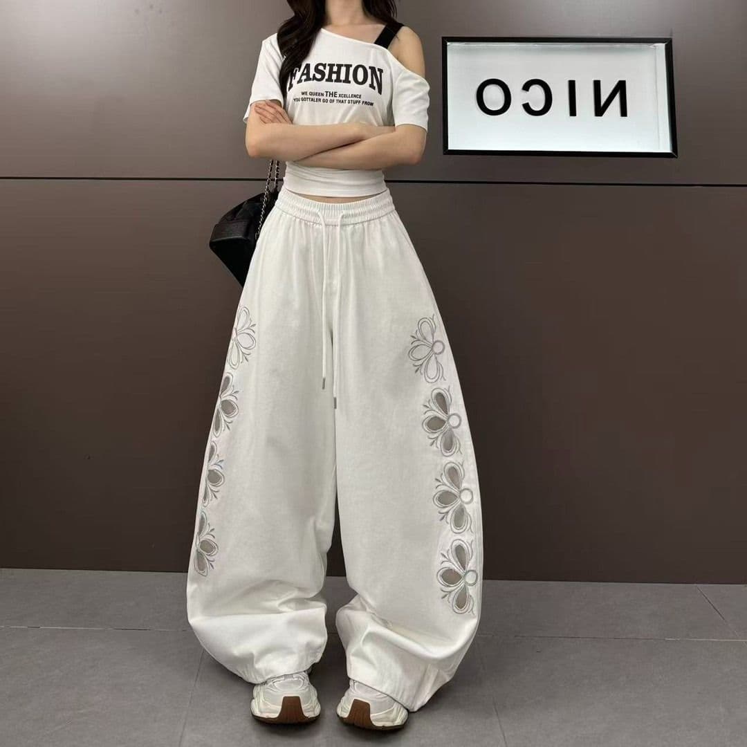 2026 년 여름 디자인 자수 홀로우 아웃 작은 대중 트렌디 차가운 넓은 다리 모통이 칼 캐주얼 바지 이미지 2