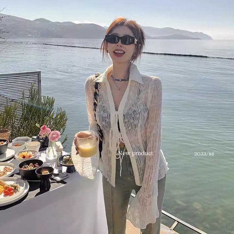 자외선 차단 의류 여성 여름 새로운 자카드 홀로우 아웃 나팔 소매 달콤한 핫걸 오픈 가디건 풍속 건조한 에어컨 셔츠 상세 이미지 5