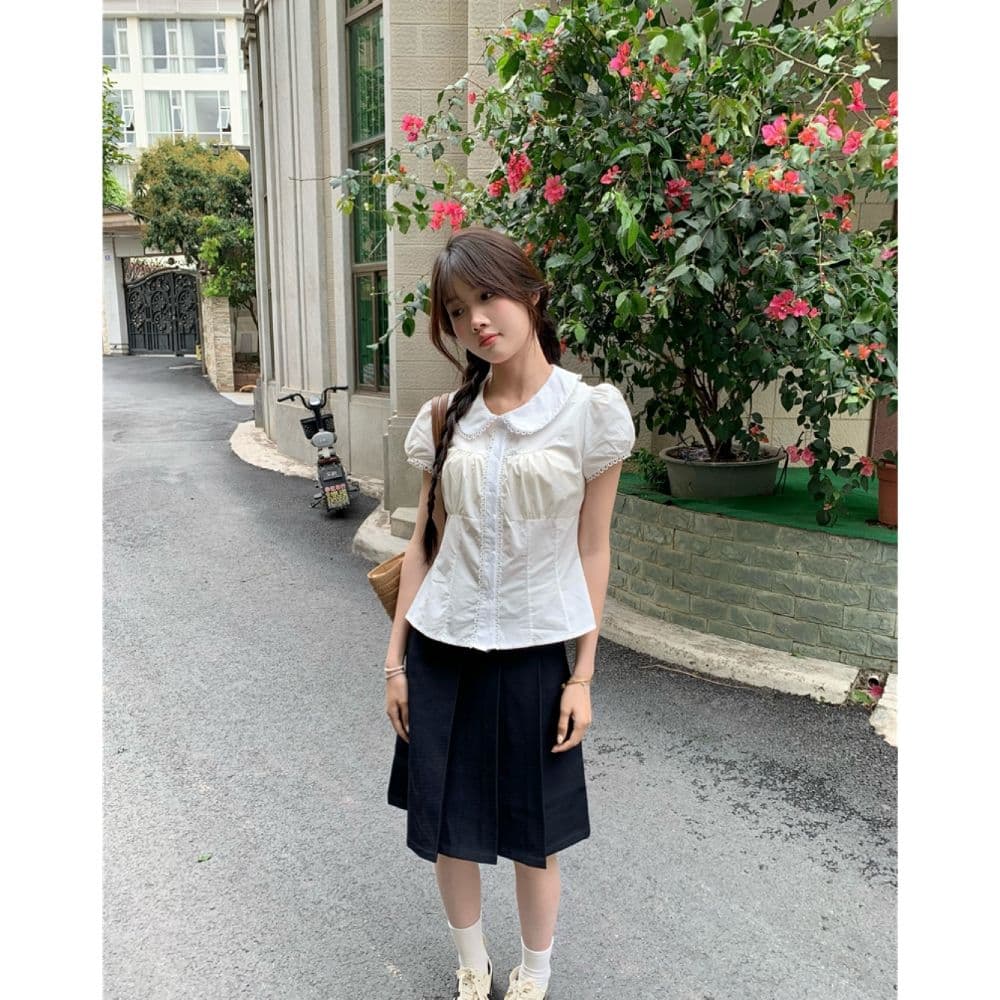 프랑스식 달콤함 화이트 베이비 칼라 셔츠 반팔 여름 학원 스타일 슬림해 보이는 여성 의류 거품 소매 인사이드 잡아라. 의류 상세 이미지 2