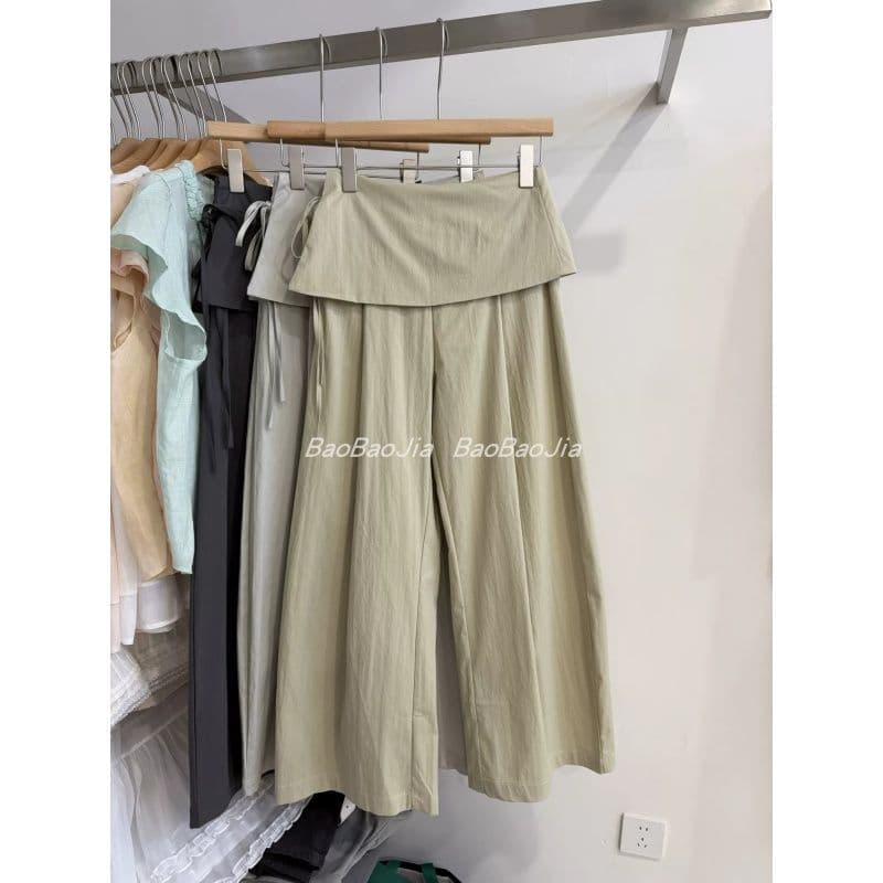 한 부서 페이크 레이어드 레이스업 랩스커트팬츠 바지 여성 2026 년 봄 새로운 미니멀리즘 단색 넓은 다리 길이 바지 이미지 3