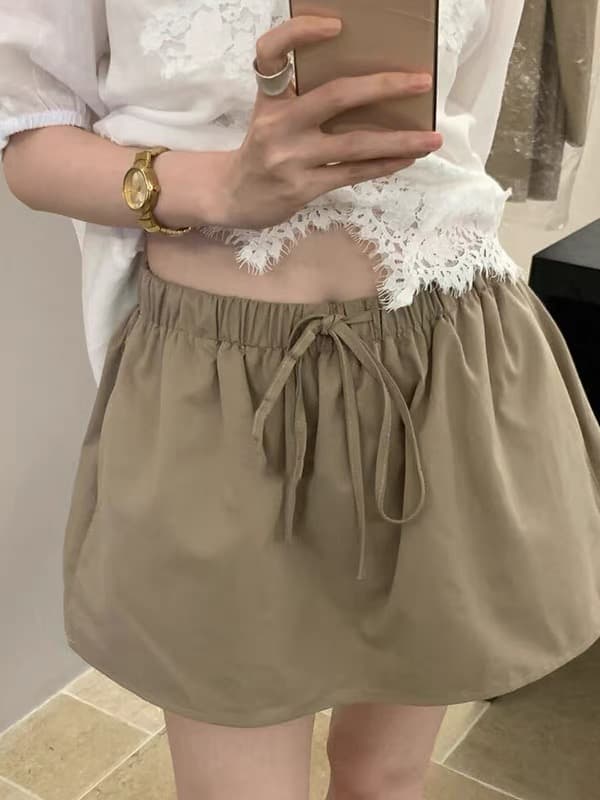 자이언트 잘 생긴 ~ 중 카키 색 꽃밭 치마바지 반신 미니 스커트 여성 2026 새로운 여름 캐주얼 레이스업 한 마디 치마 이미지 3