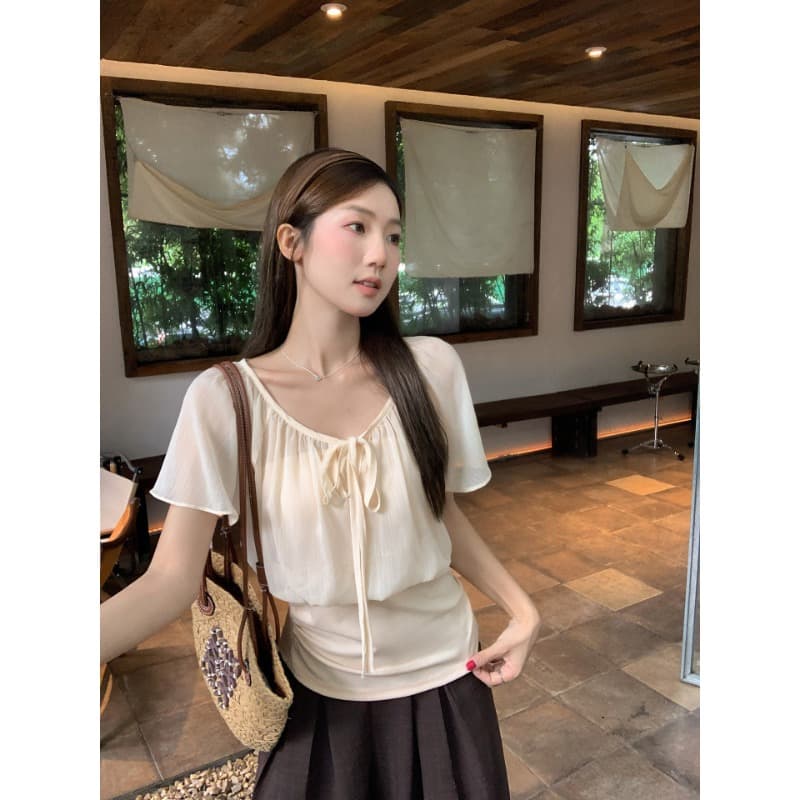 우 77 얕은 살구 색상 페이크 레이어드 패치워크 레이스업 V넥 연꽃 잎 소매 여성 셔츠 여름 허리 수축 슬림해 보이는 품격 맨위 이미지 2
