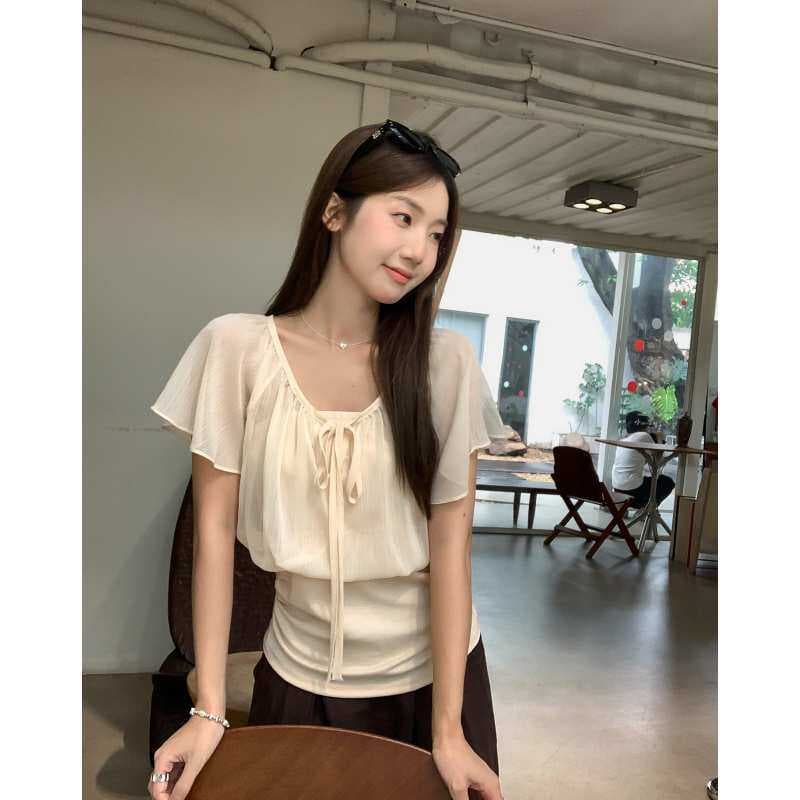 우 77 얕은 살구 색상 페이크 레이어드 패치워크 레이스업 V넥 연꽃 잎 소매 여성 셔츠 여름 허리 수축 슬림해 보이는 품격 맨위 이미지 3
