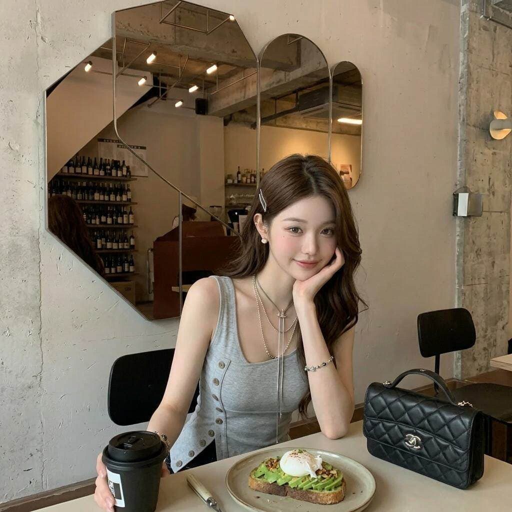 2026 여름 새로운 핫걸 바람 디자인 센스 비스듬한 칼라 비대칭 트임 단추 조끼 여성 민소매 맨위 여성