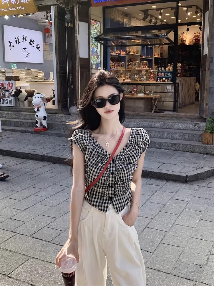 홍콩 느낌 레트로 흑인과 백인 체크무늬 V넥 민소매 여성 셔츠 여름 작은 대중 디자인 센스 몸매 가꾸기 슬림해 보이는 쇼트 스타일 맨위 상세 이미지 3